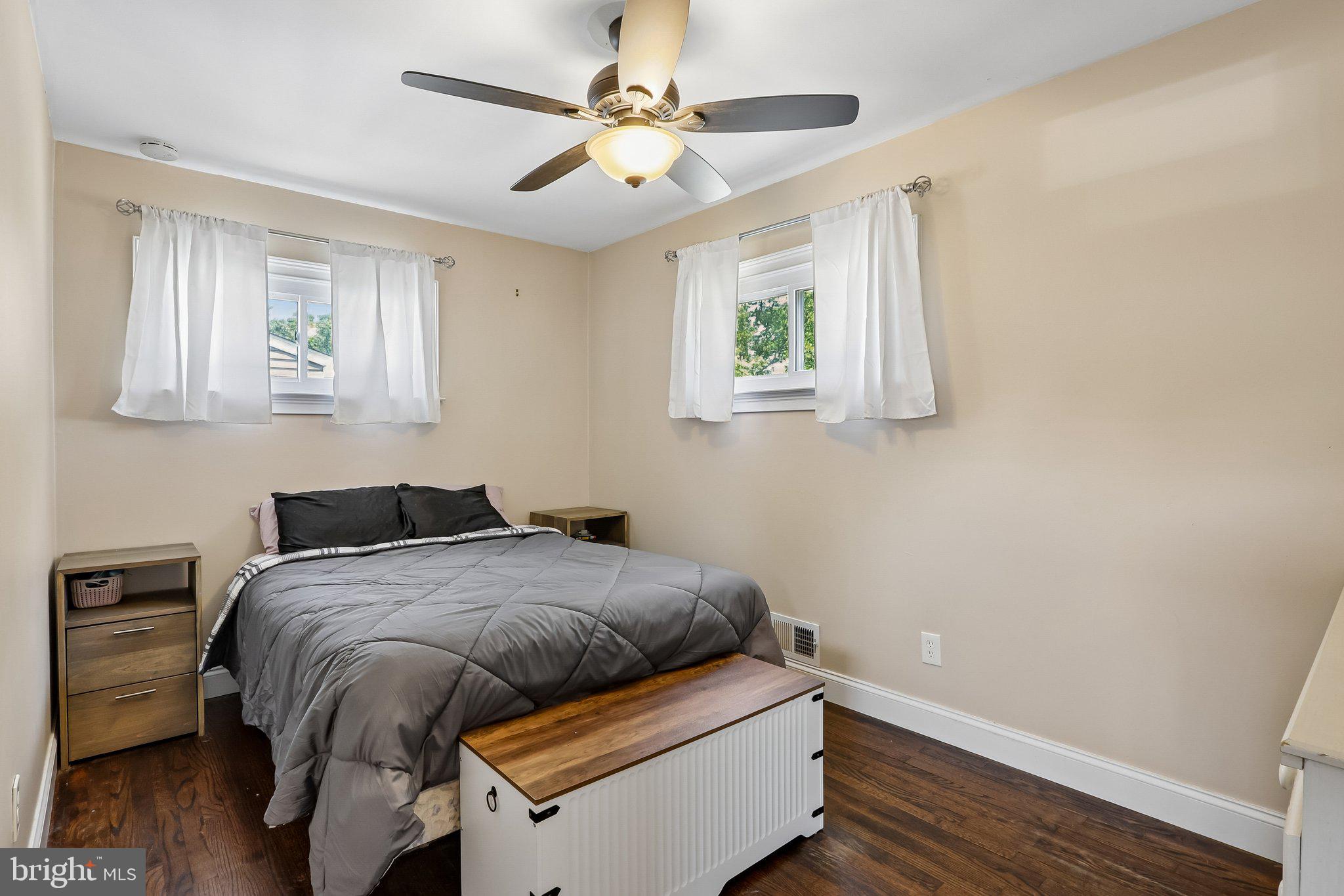 73 Burnt Tavern Road Brick, NJ 08724 - Photo 17 of 31 a bed sitting in a bedroom next to a window