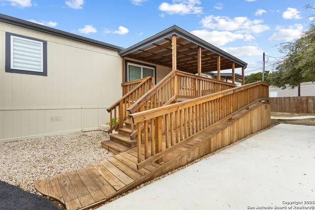 a view of entryway with a front door