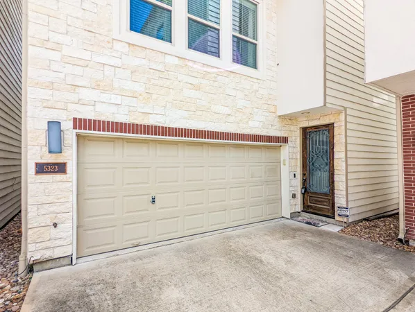 a view of a house with garage