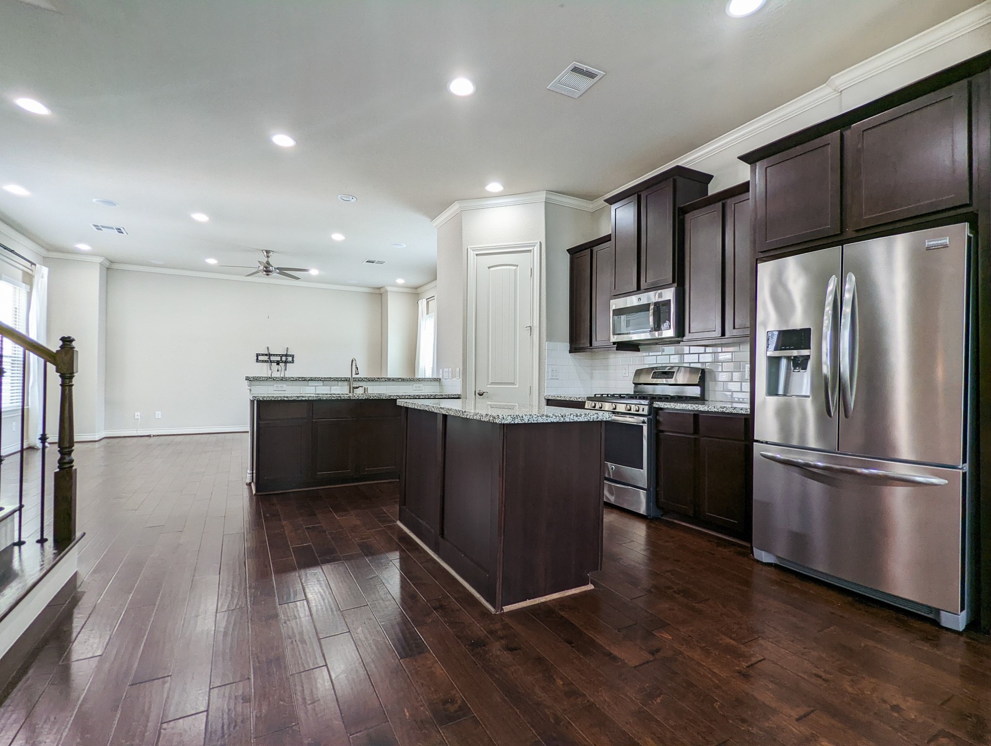 5323 Kiam Street Houston, TX 77007 - Photo 7 of 28 a kitchen with a refrigerator and a sink