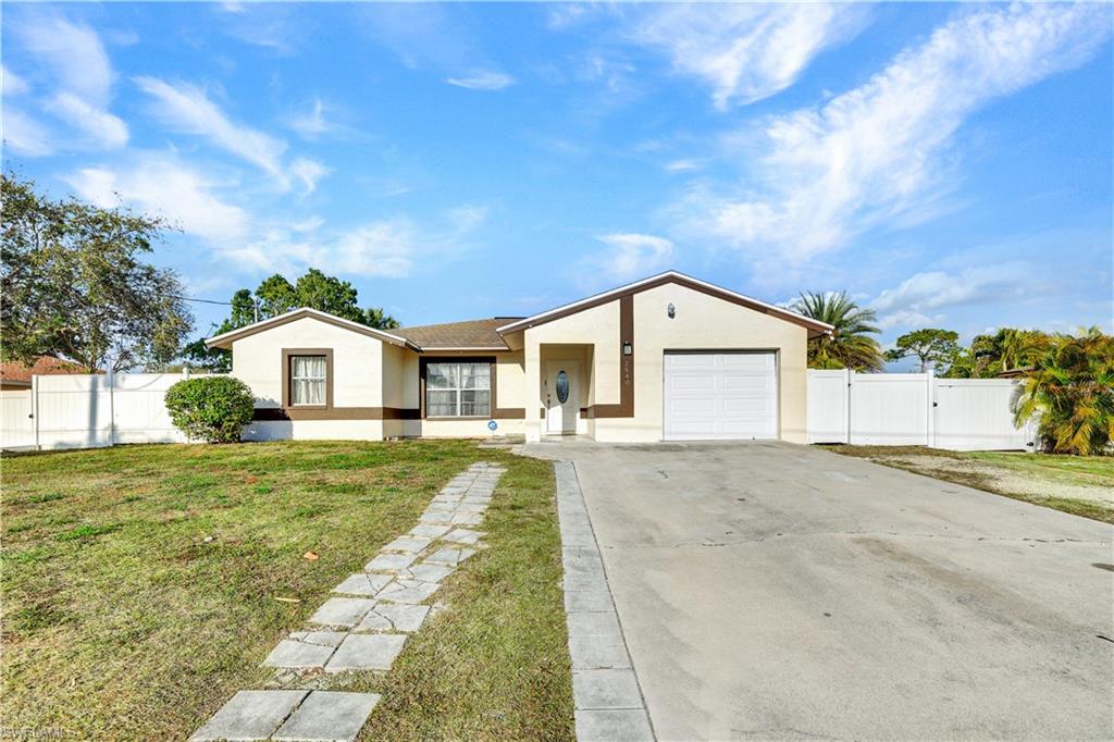 2540 47th Terrace Southwest Naples, FL 34116 - Photo 17 of 17 a view of big yard in front of house
