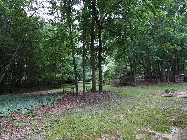 2617 Salisbury Raleigh, NC 27613 - Photo 11 of 11 a view of outdoor space with deck and yard