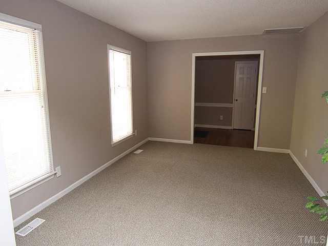 2617 Salisbury Raleigh, NC 27613 - Photo 3 of 11 a view of an empty room with a window