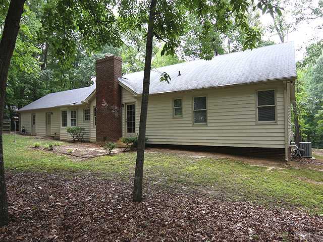 2617 Salisbury Raleigh, NC 27613 - Photo 10 of 11 a backyard of a house with lots of green space