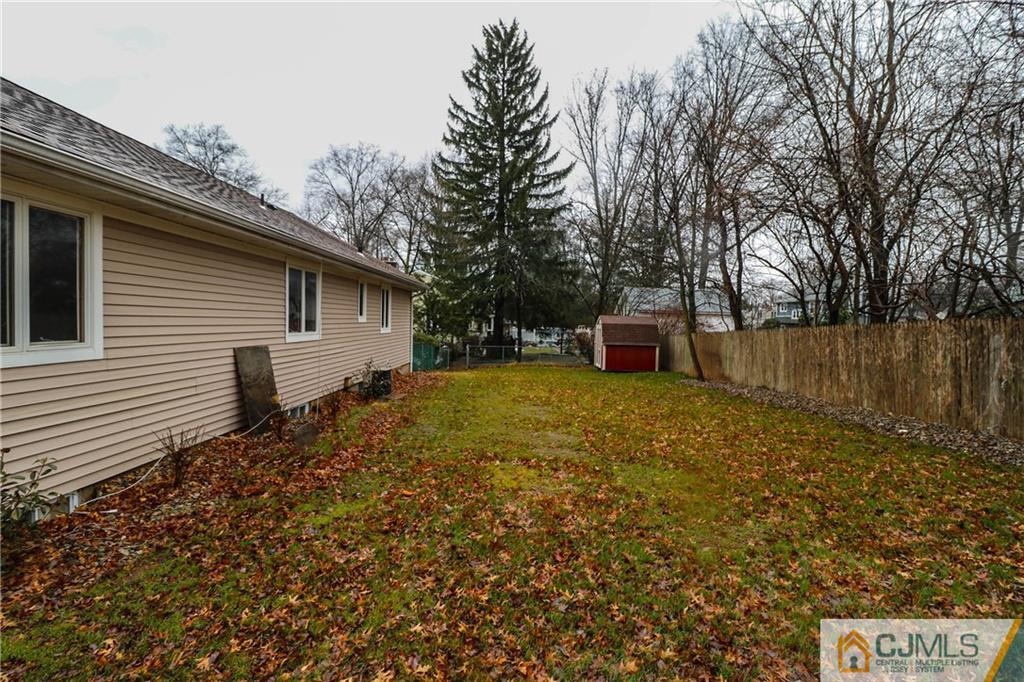 355 Chain O' Hills Road Colonia, NJ 07067 - Photo 24 of 25 a backyard of a house