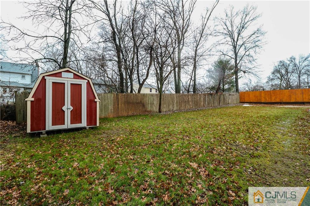 355 Chain O' Hills Road Colonia, NJ 07067 - Photo 25 of 25 a view of backyard with large trees