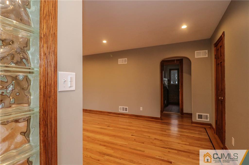 355 Chain O' Hills Road Colonia, NJ 07067 - Photo 4 of 25 a view of livingroom with wooden floor