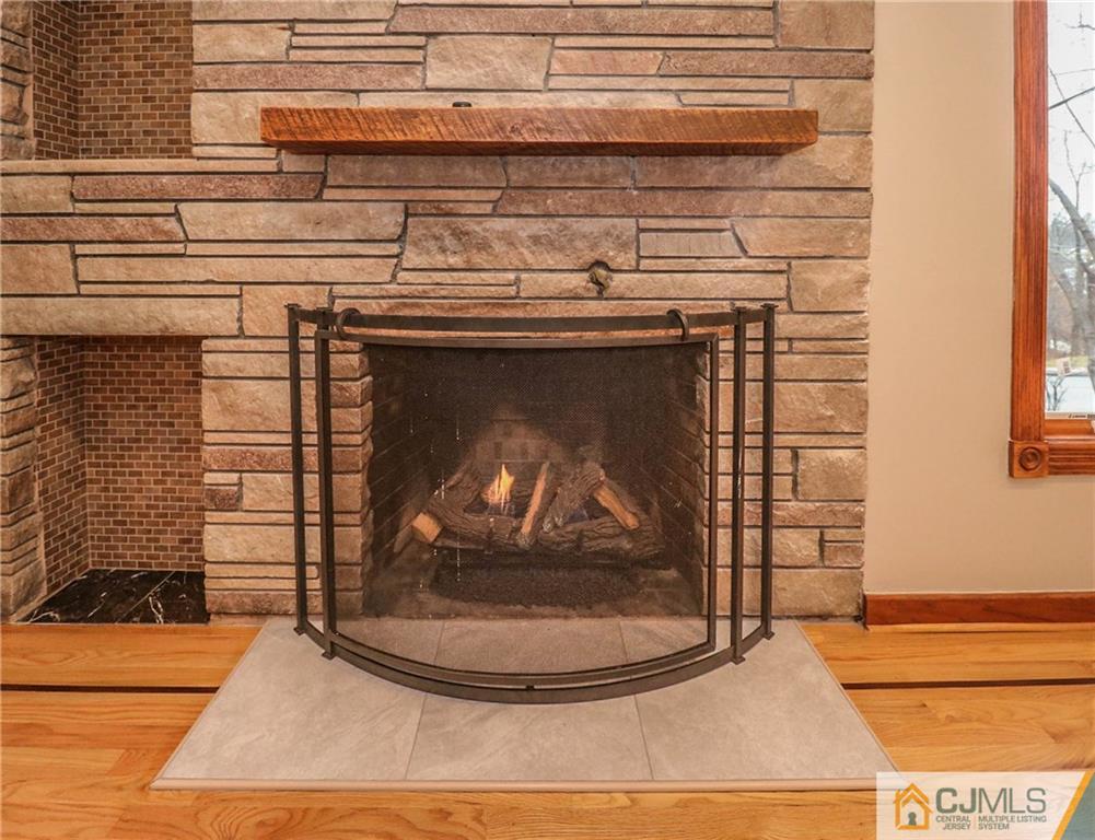 355 Chain O' Hills Road Colonia, NJ 07067 - Photo 8 of 25 a view of a fireplace