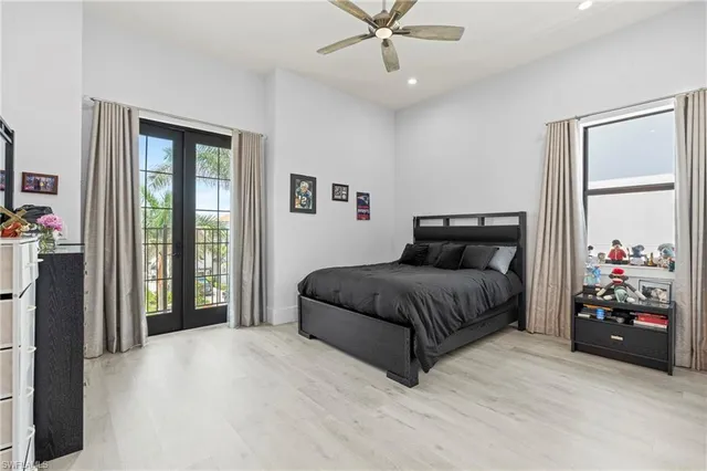 a bed room with a bed and a window