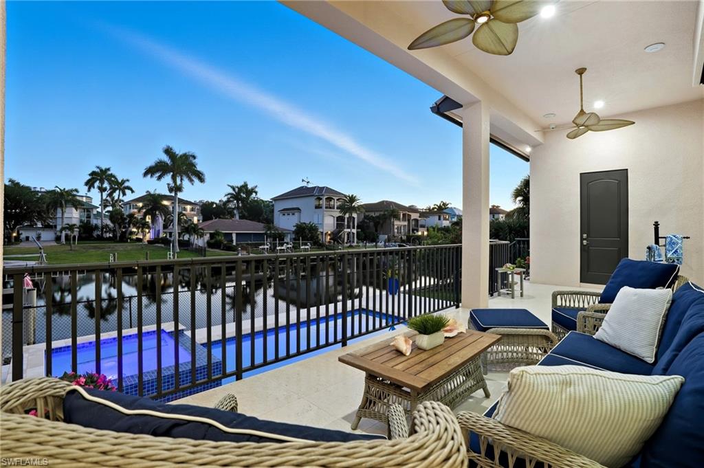 388 Pine Avenue Naples, FL 34108 - Photo 32 of 42 a view of a balcony with furniture