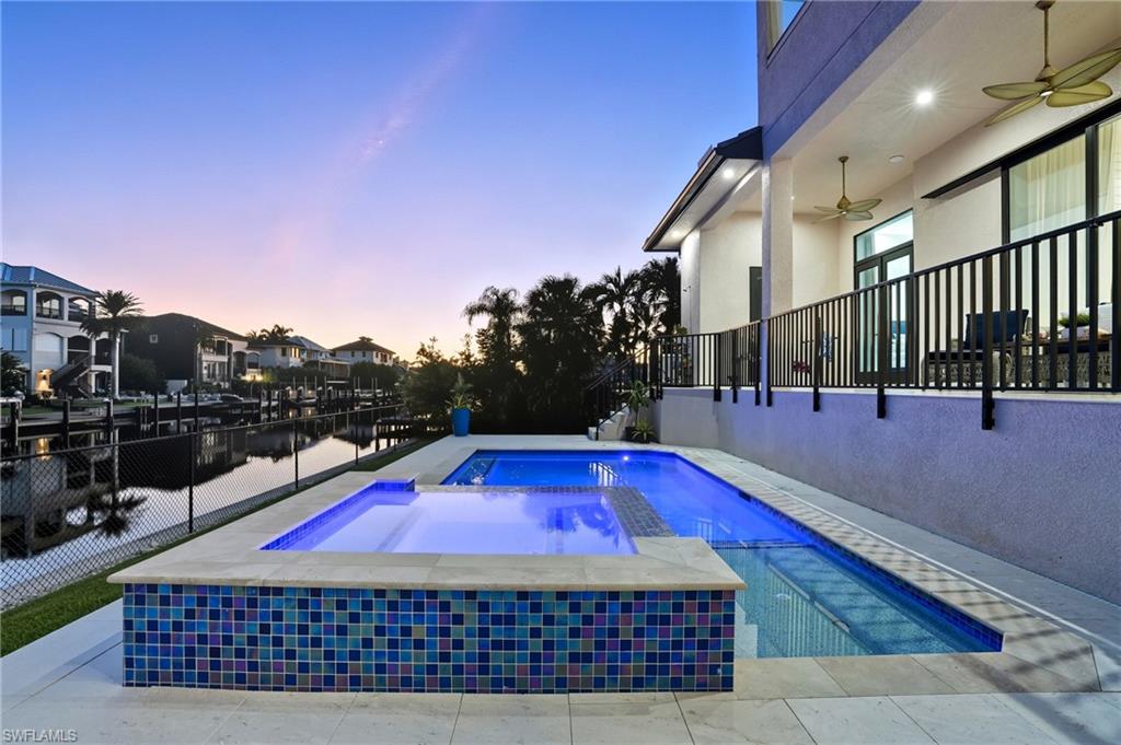 388 Pine Avenue Naples, FL 34108 - Photo 36 of 42 a view of swimming pool with chairs