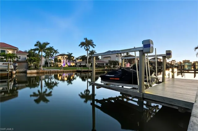 a view of swimming pool with chairs