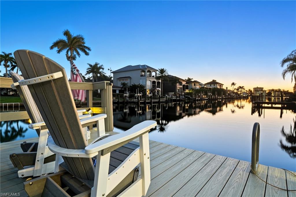 388 Pine Avenue Naples, FL 34108 - Photo 39 of 42 a view of a balcony with chairs