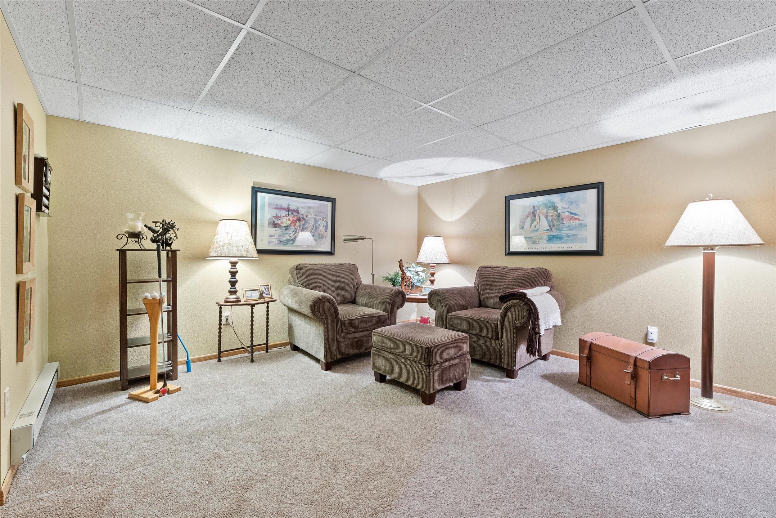 1089 Creeks Cross Road, Unit 2B Kohler, WI 53044 - Photo 18 of 28 31-Lower Level Sitting Room