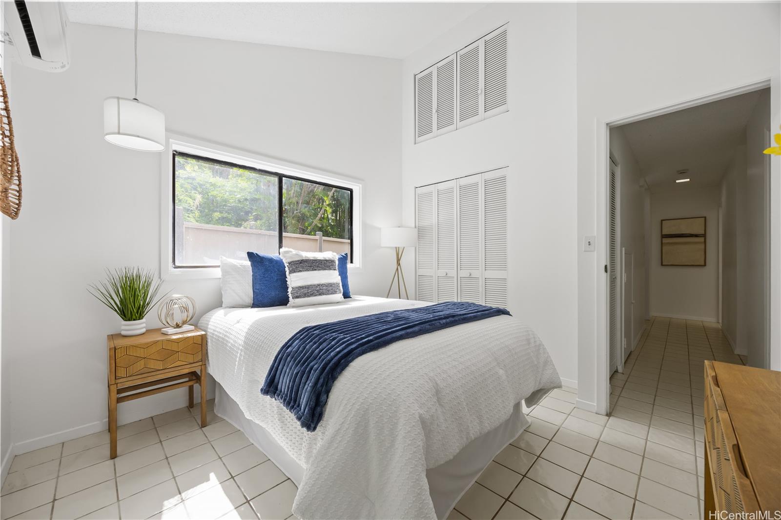 45-995 Wailele Road, Unit 35 Kaneohe, HI 96744 - Photo 17 of 25 Second bedroom with small courtyard and vaulted ceilings