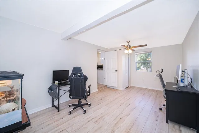 a view of workspace with wooden floor