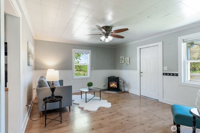 a living room with furniture and a window