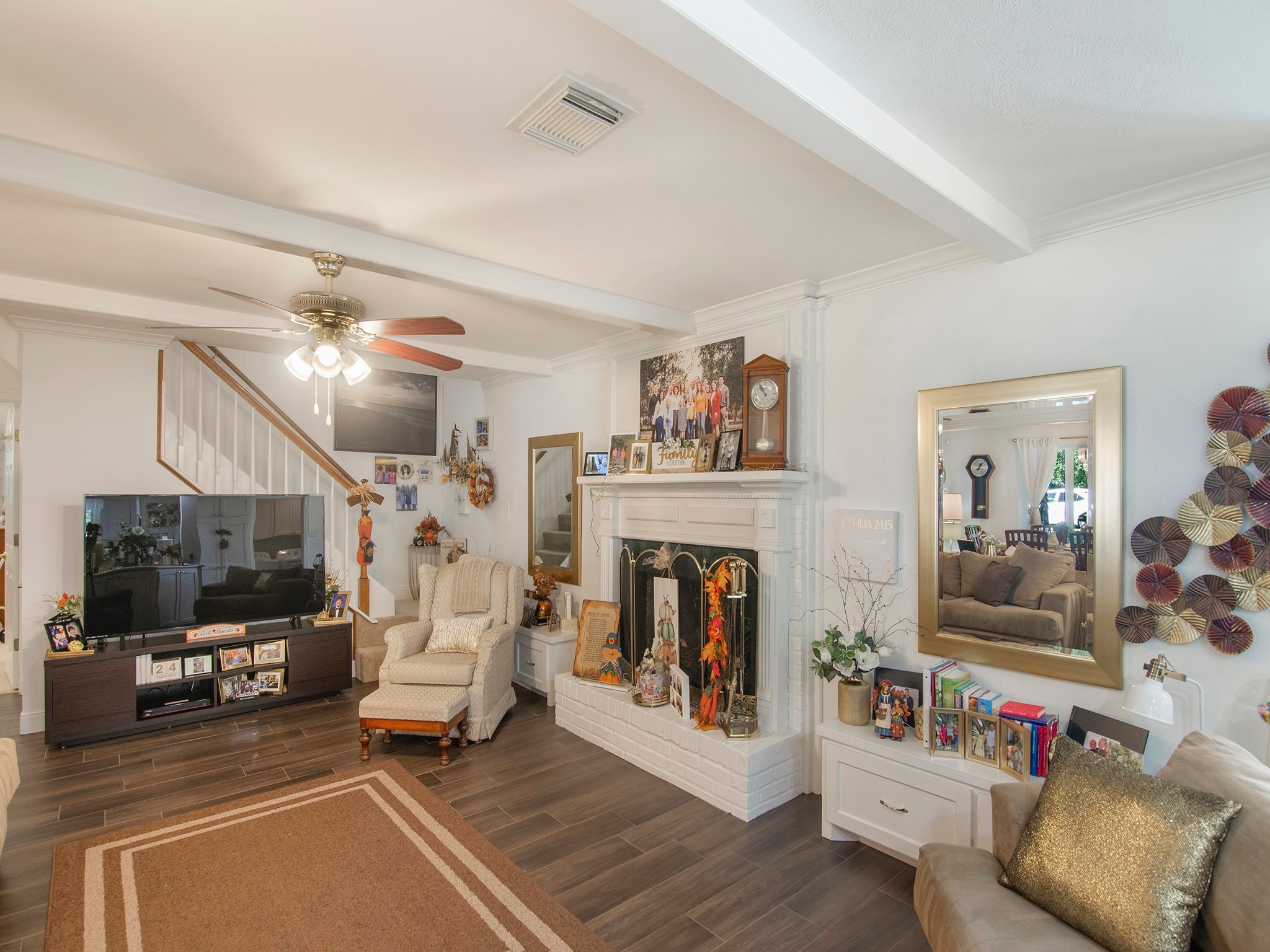 532 Raleigh Drive Conroe, TX 77302 - Photo 10 of 40 a living room with furniture and a fireplace