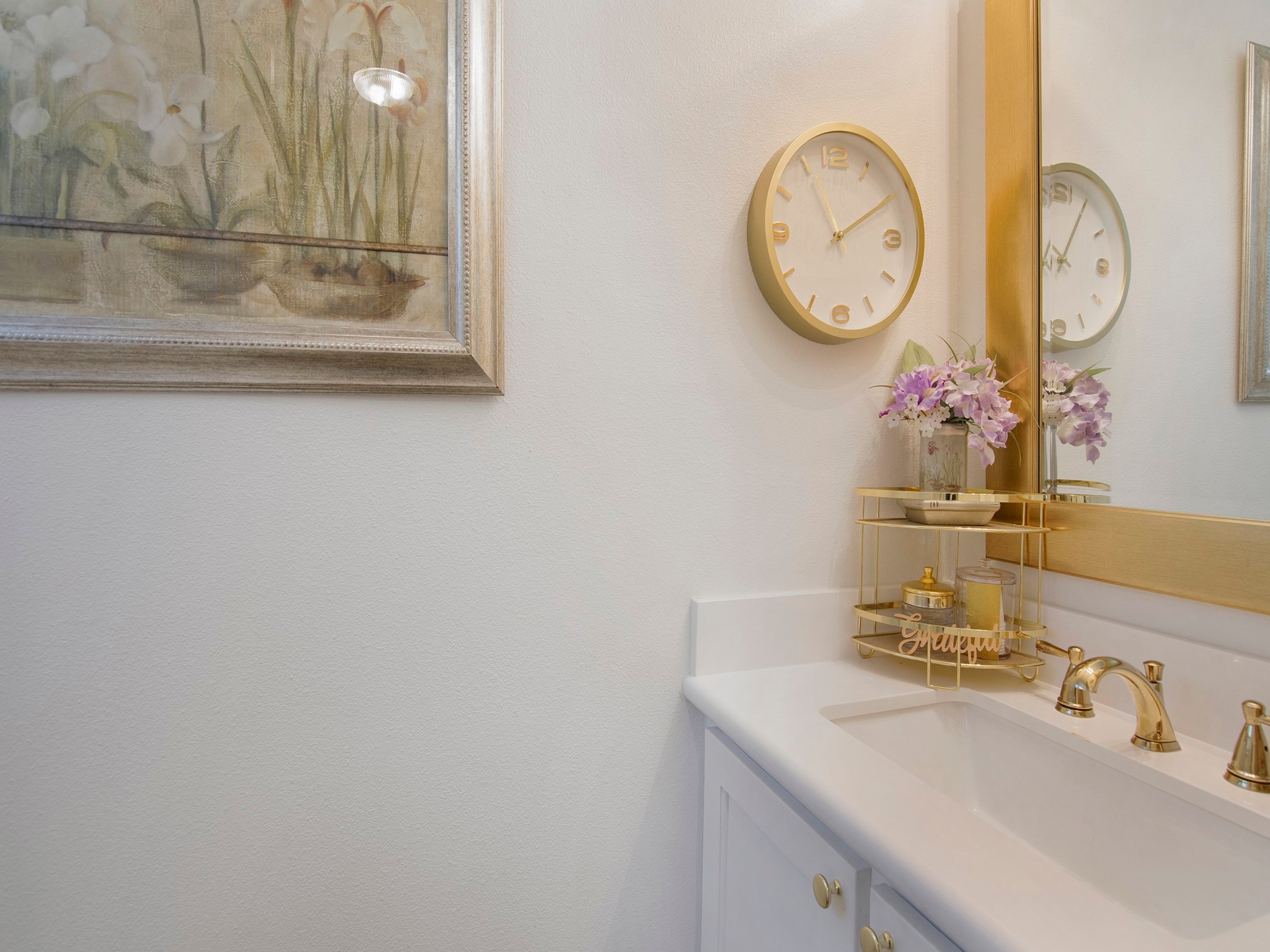 532 Raleigh Drive Conroe, TX 77302 - Photo 18 of 40 a bathroom with a sink and a mirror
