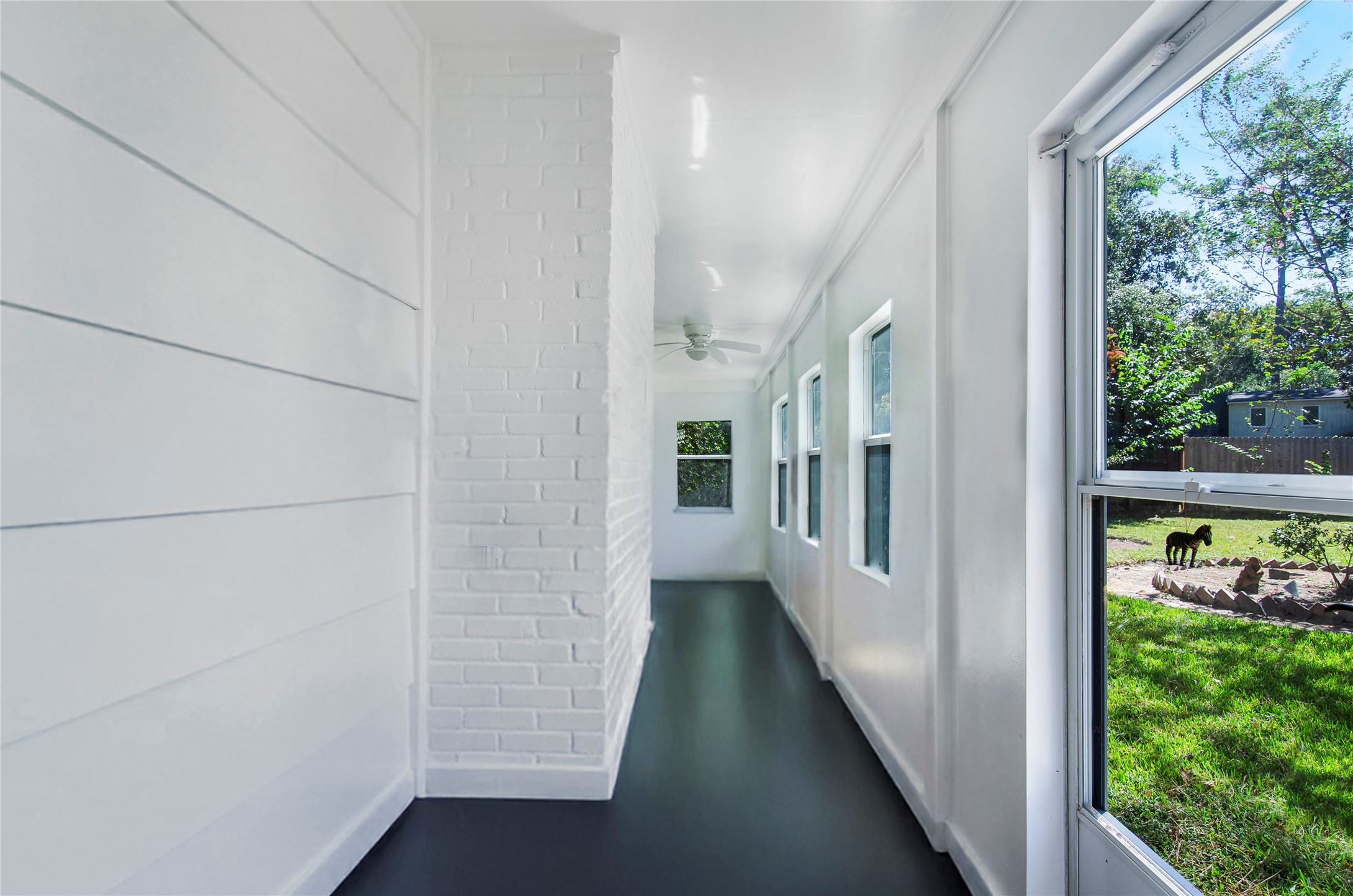 532 Raleigh Drive Conroe, TX 77302 - Photo 28 of 40 Operational windows and back door leading to the yard.