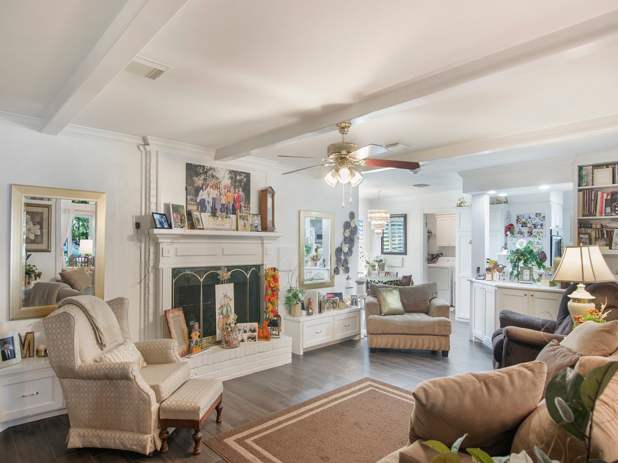 532 Raleigh Drive Conroe, TX 77302 - Photo 7 of 40 a living room with furniture and a fireplace