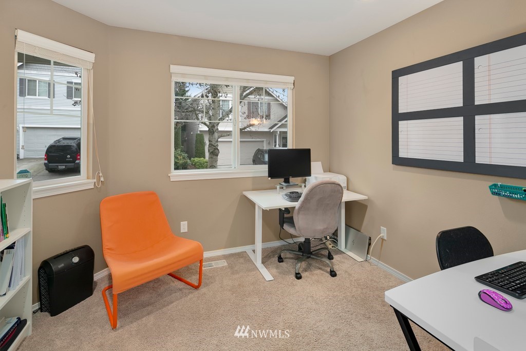2425 194th Street Southeast, Unit 40 Bothell, WA 98012 - Photo 8 of 20 a workspace with furniture and window