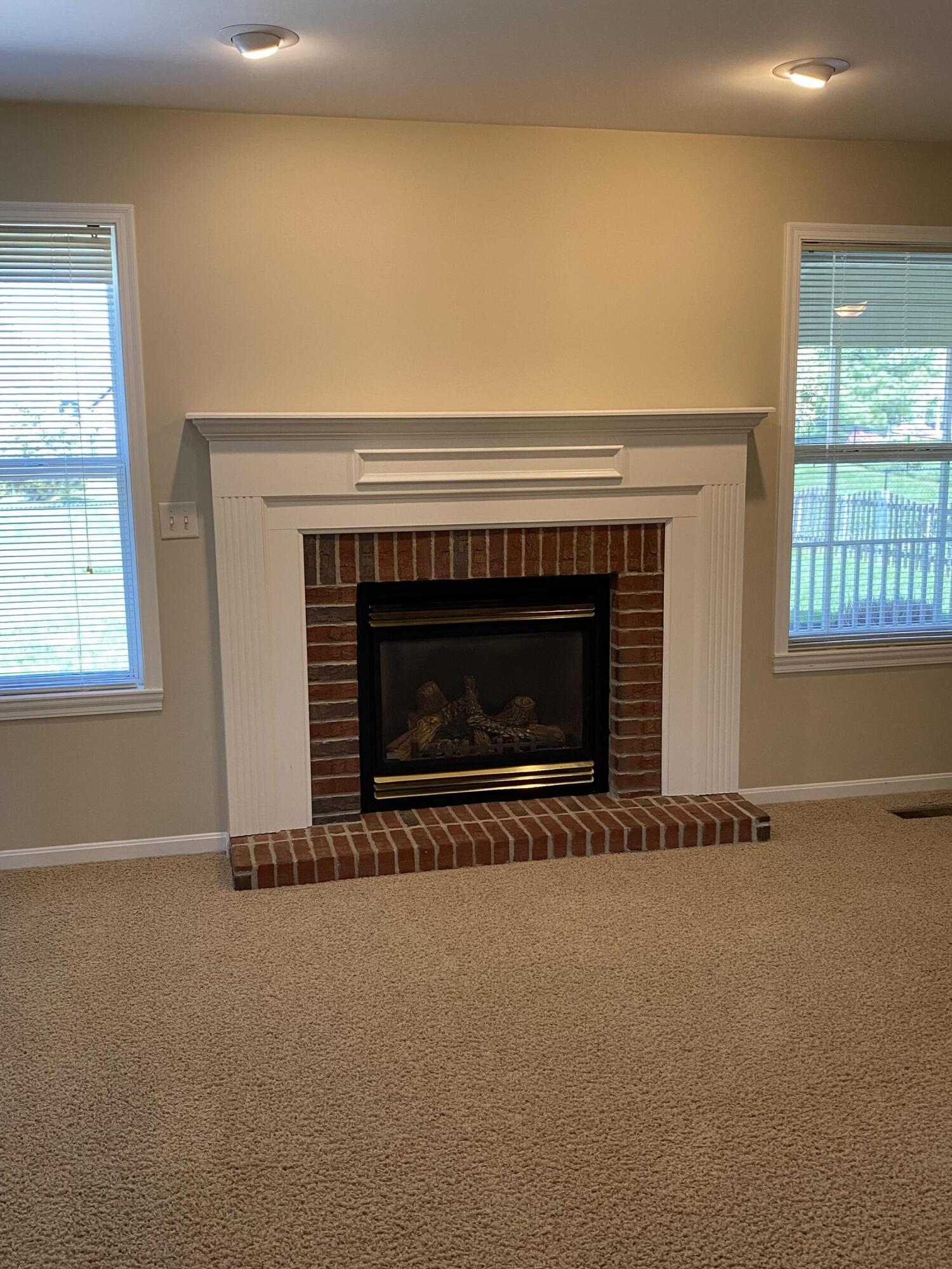 8964 Richmond Road Union, KY 41091 - Photo 9 of 48 Lovely gas fireplace with lots of natural light.