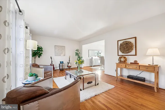 a kitchen with stainless steel appliances a sink stove and cabinets