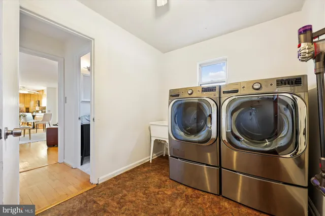 a bedroom with a large bed and a couch