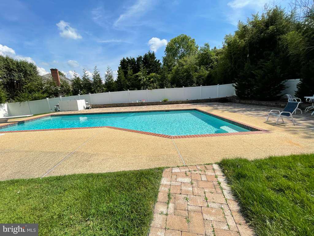 9304 Bells Mill Road Potomac, MD 20854 - Photo 3 of 74 Custom pool in fenced backyard w/brick patio