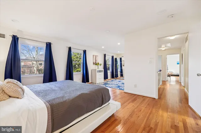 a room with a sink and a mirror