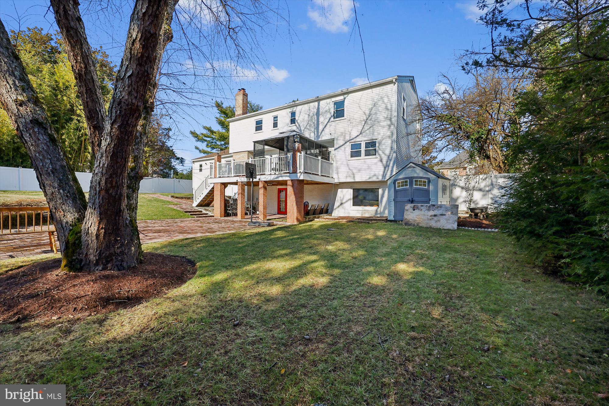 9304 Bells Mill Road Potomac, MD 20854 - Photo 70 of 74 a view of a house with a yard