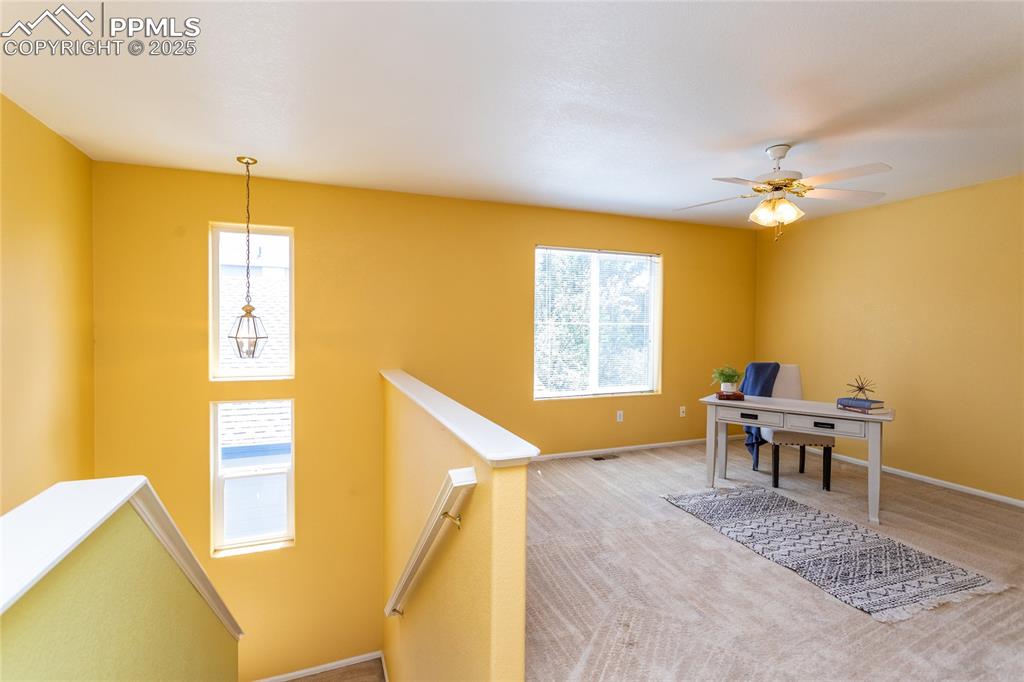 6815 Anchor Point Colorado Springs, CO 80922 - Photo 19 of 46 a dining room with a window