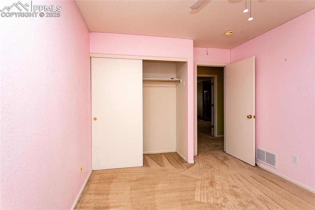 6815 Anchor Point Colorado Springs, CO 80922 - Photo 33 of 46 a view of an empty room