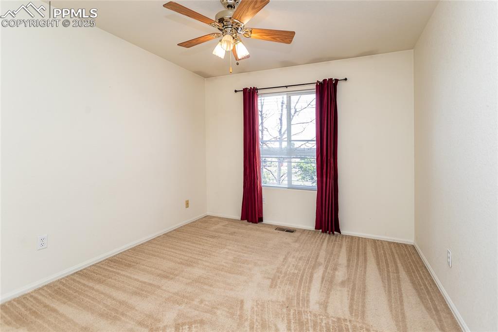 6815 Anchor Point Colorado Springs, CO 80922 - Photo 35 of 46 a view of empty room with window