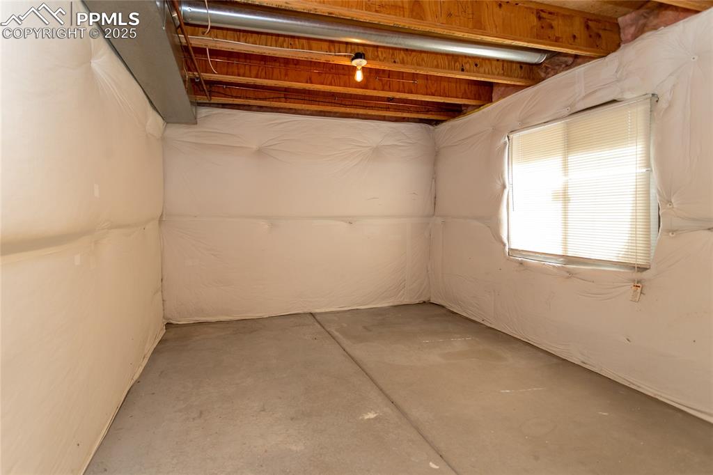 6815 Anchor Point Colorado Springs, CO 80922 - Photo 41 of 46 a view of a room with window