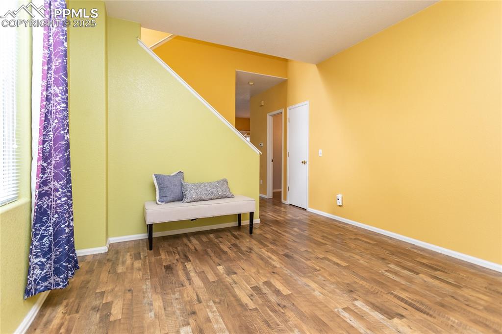 6815 Anchor Point Colorado Springs, CO 80922 - Photo 9 of 46 a view of a room with toys and wooden floor