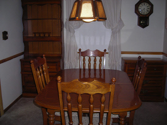 1621 Warren Road Rockford, IL 61108 - Photo 4 of 11 a view of a dining room with furniture and wooden floor