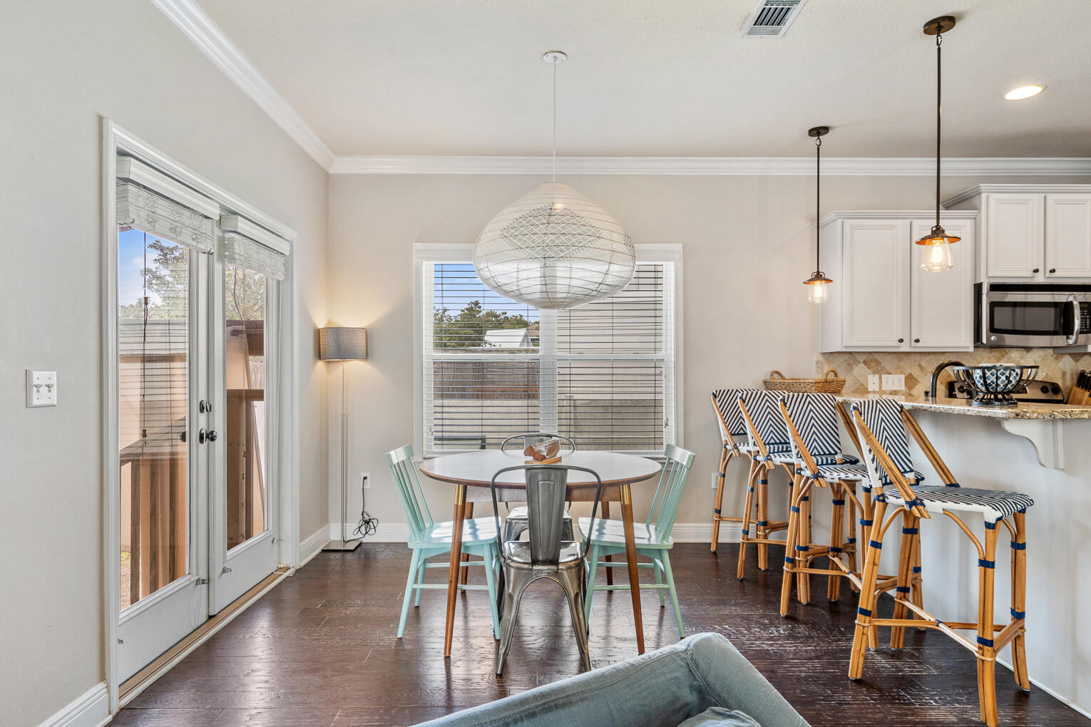 85 Grayling Way Inlet Beach, FL 32461 - Photo 16 of 64 a view of a dining room with furniture a chandelier and wooden floor