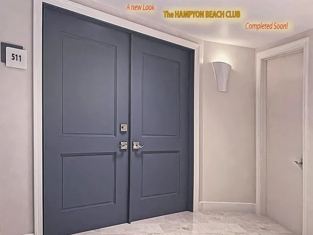 a kitchen with white cabinets and appliances