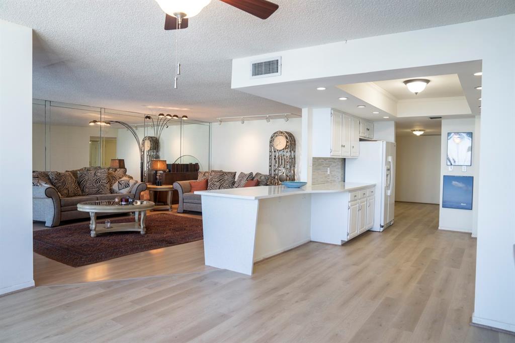 1800 South Ocean Boulevard, Unit 511 Pompano Beach, FL 33062 - Photo 15 of 48 a large living room with stainless steel appliances kitchen island granite countertop furniture and a kitchen view