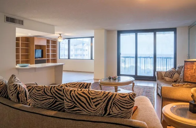 a bathroom with a sink vanity and a mirror