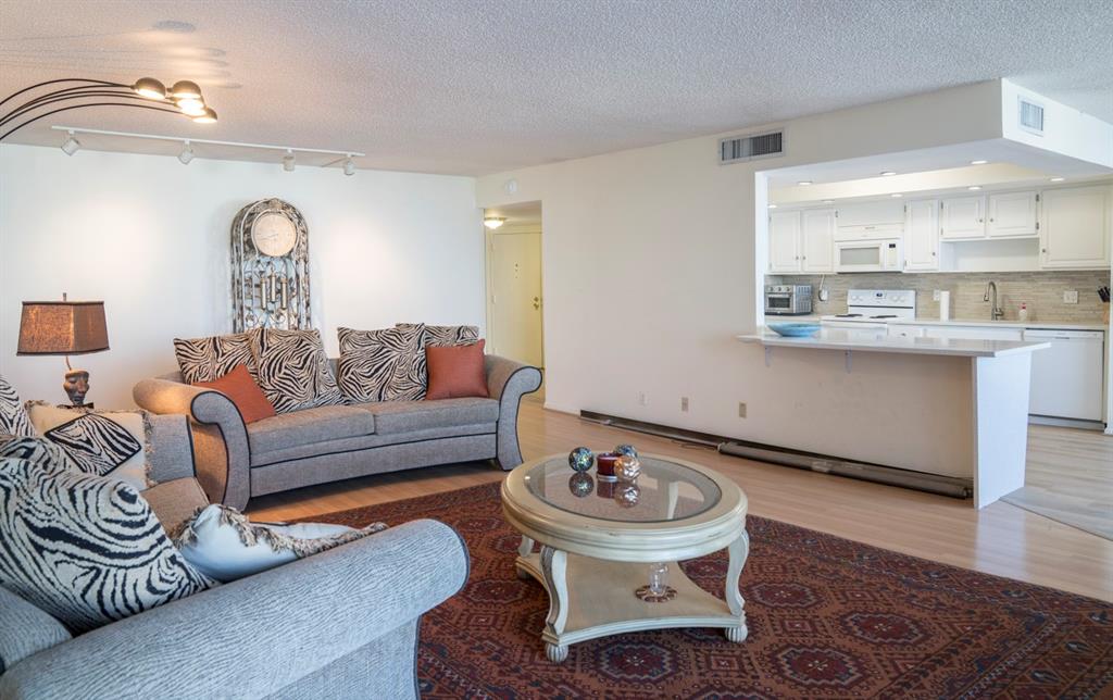 1800 South Ocean Boulevard, Unit 511 Pompano Beach, FL 33062 - Photo 25 of 48 a living room with furniture and wooden floor