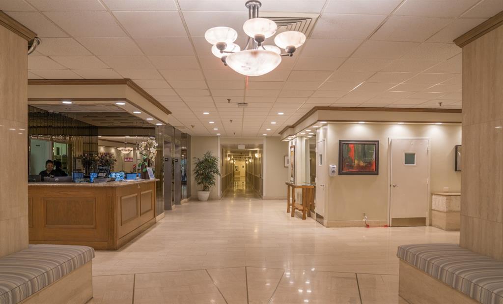 1800 South Ocean Boulevard, Unit 511 Pompano Beach, FL 33062 - Photo 41 of 48 a view of a lobby with furniture and chandelier