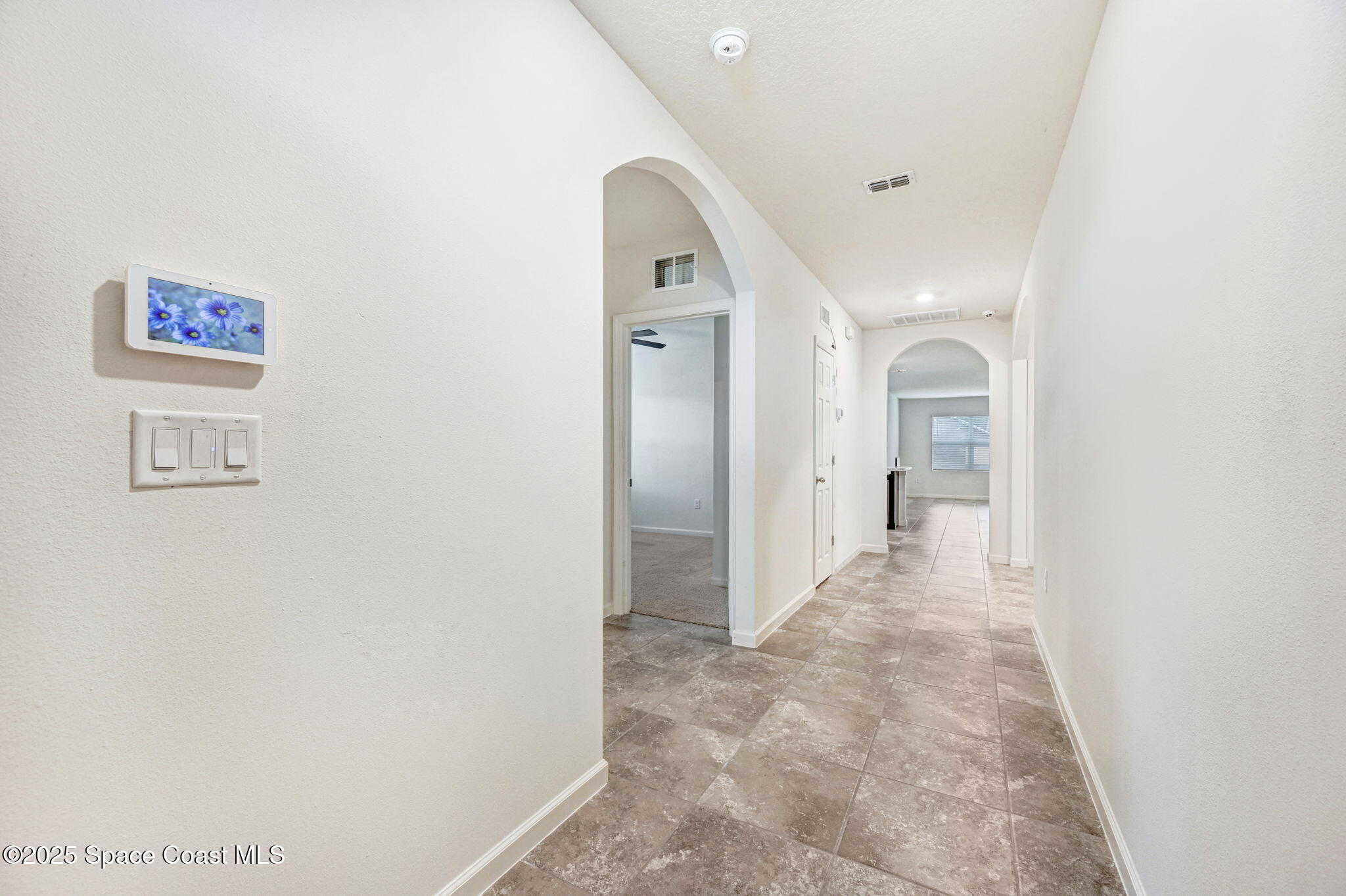481 Tilhal Road Southwest Palm Bay, FL 32908 - Photo 8 of 23 Long Foyer for decorating & 2 Closets