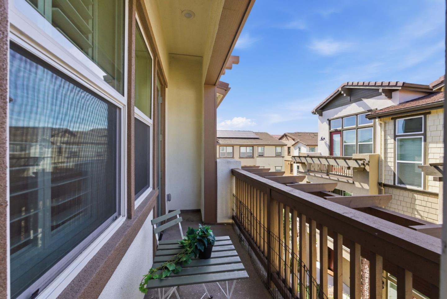 195 Carson Falls Common Fremont, CA 94539 - Photo 13 of 52 a view of a balcony with a potted plant