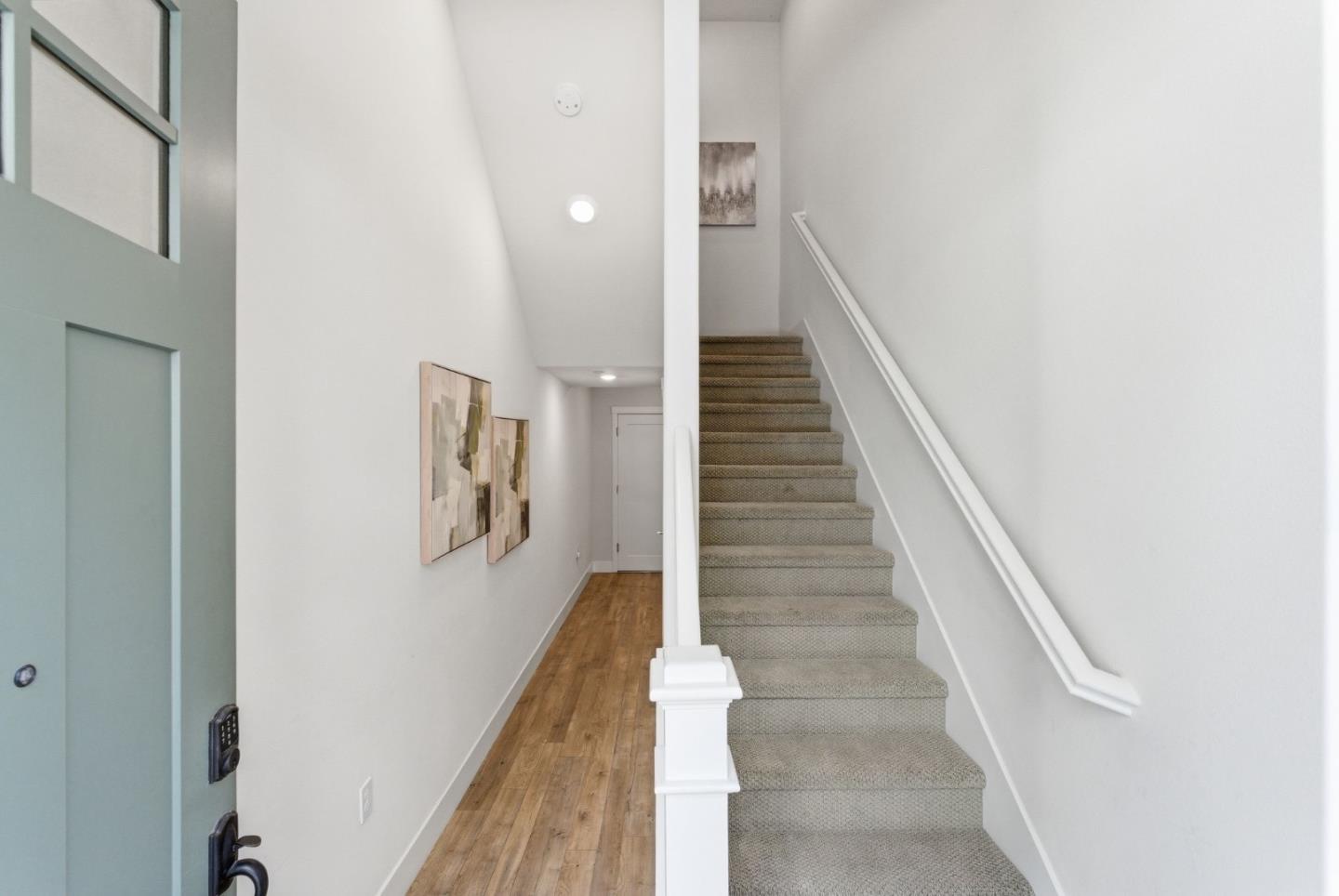 195 Carson Falls Common Fremont, CA 94539 - Photo 3 of 52 a view of entryway and hall with wooden floor