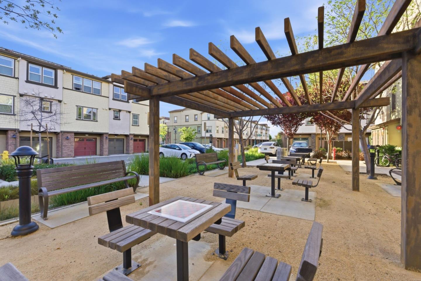 195 Carson Falls Common Fremont, CA 94539 - Photo 45 of 52 a view of a patio with table and chairs and potted plants