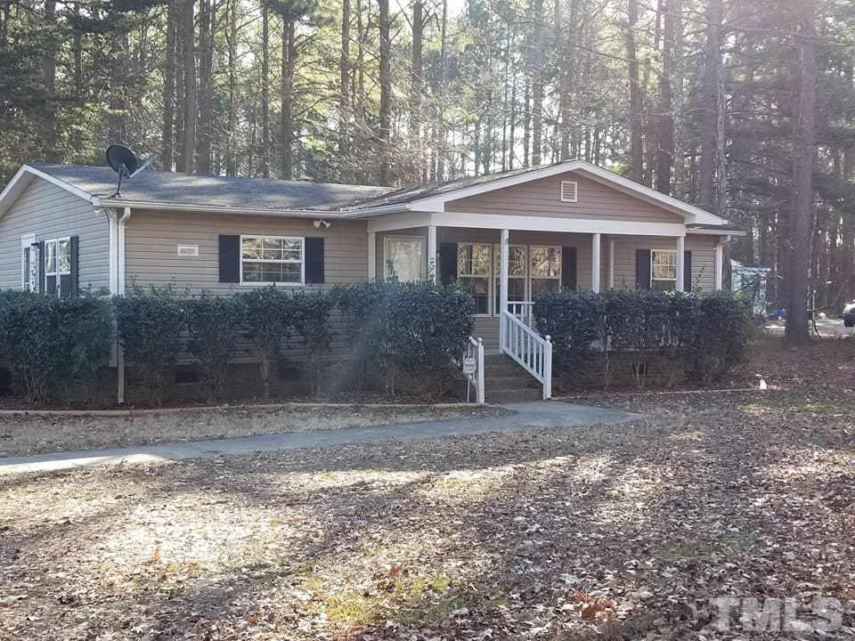 900 Milton Road Durham, NC 27712 - Photo 1 of 21 a front view of a house with a yard
