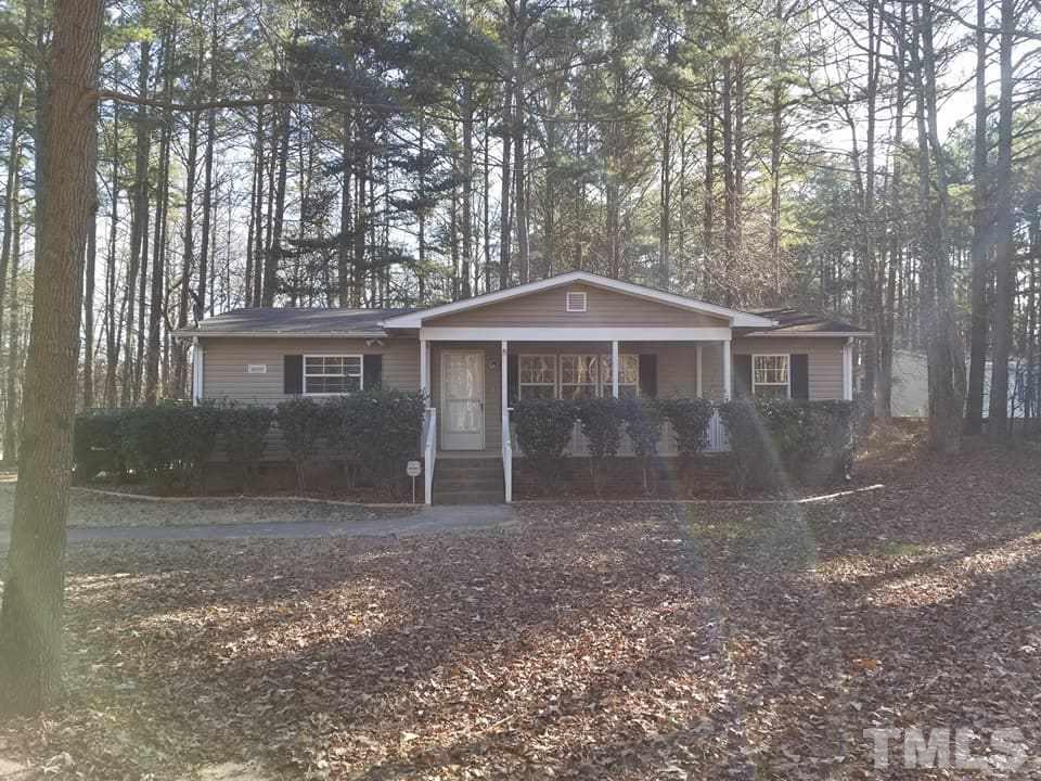 900 Milton Road Durham, NC 27712 - Photo 2 of 21 a front view of a house with yard